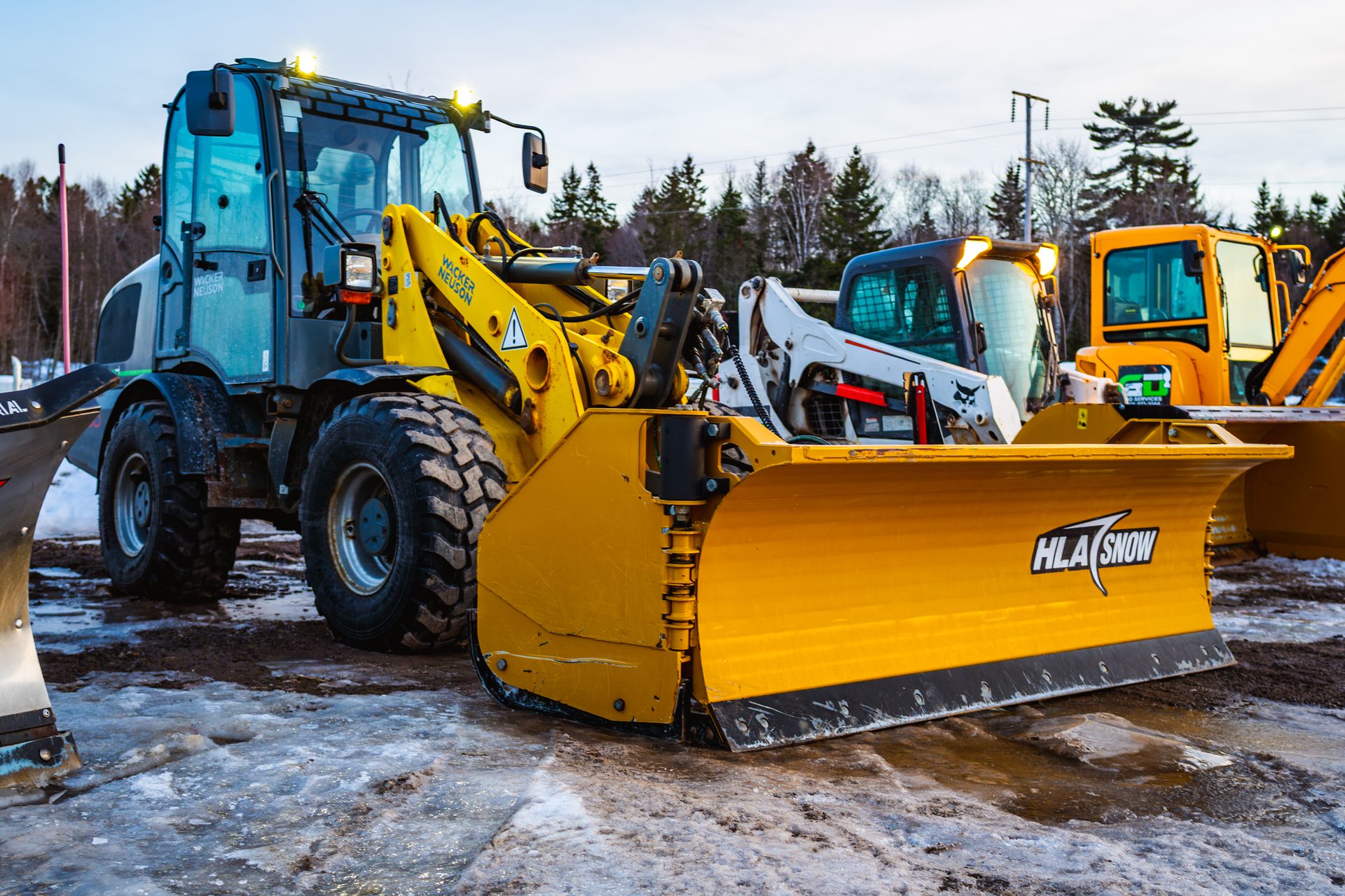 GD Outdoor Services landscaping equipment — loader New Brunswick